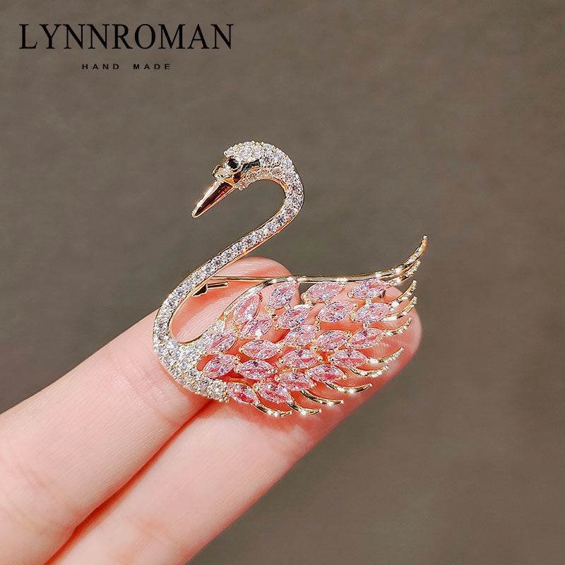 Illuminate Your Elegance: Pink Crystal Swan Brooch